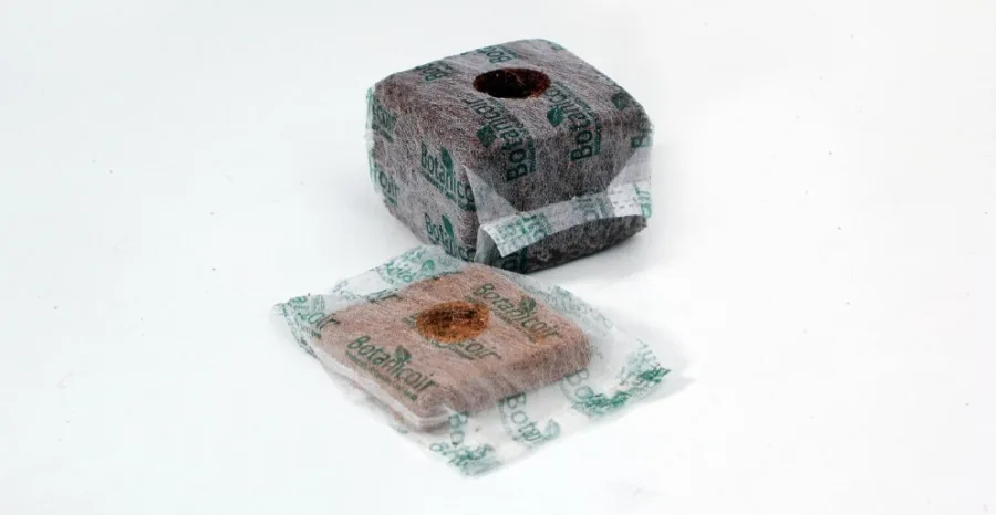 Coir Grow Cubes, two propagation cube formats shown together, in decomposable netting (Precision Start / BotaniCubes range)