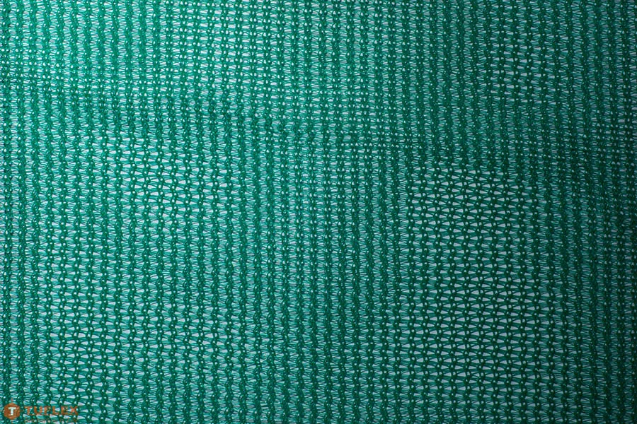 Monofilament Knitted Fabric, clean close-up swatch of the green knitted monofilament net fabric; the closest thing on the site to a studio product shot